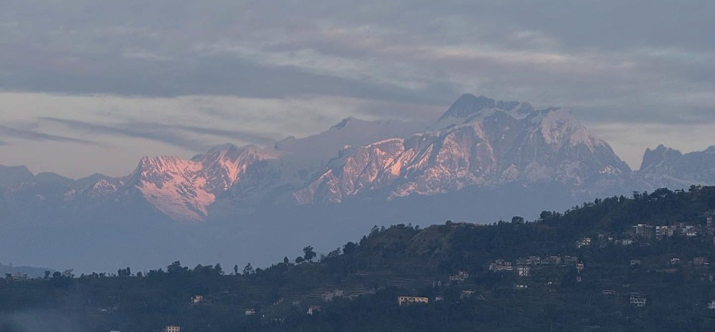 Sunrise on the Manaslu range seen across the Gorkha hills from the hotel